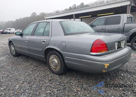 1999 Ford Crown Victoria Police Interceptor z USA, uszkodzony, nr VIN 2FAFP71W9XX238738